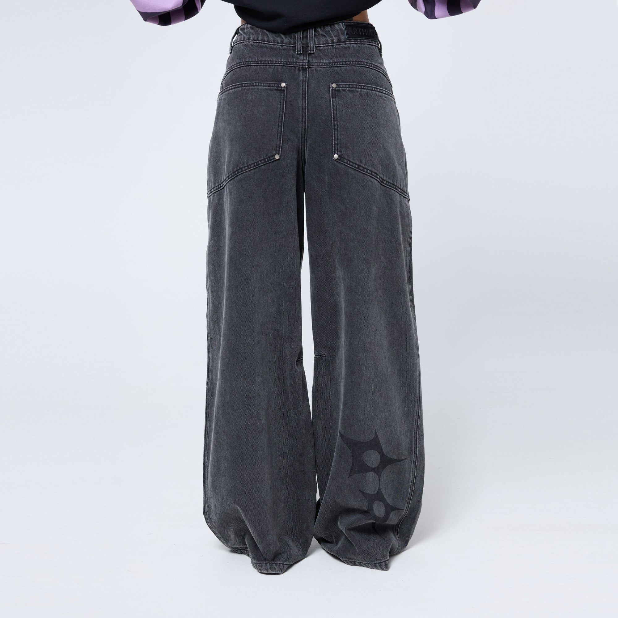 Slouchy Spike Jeans in Worn Black