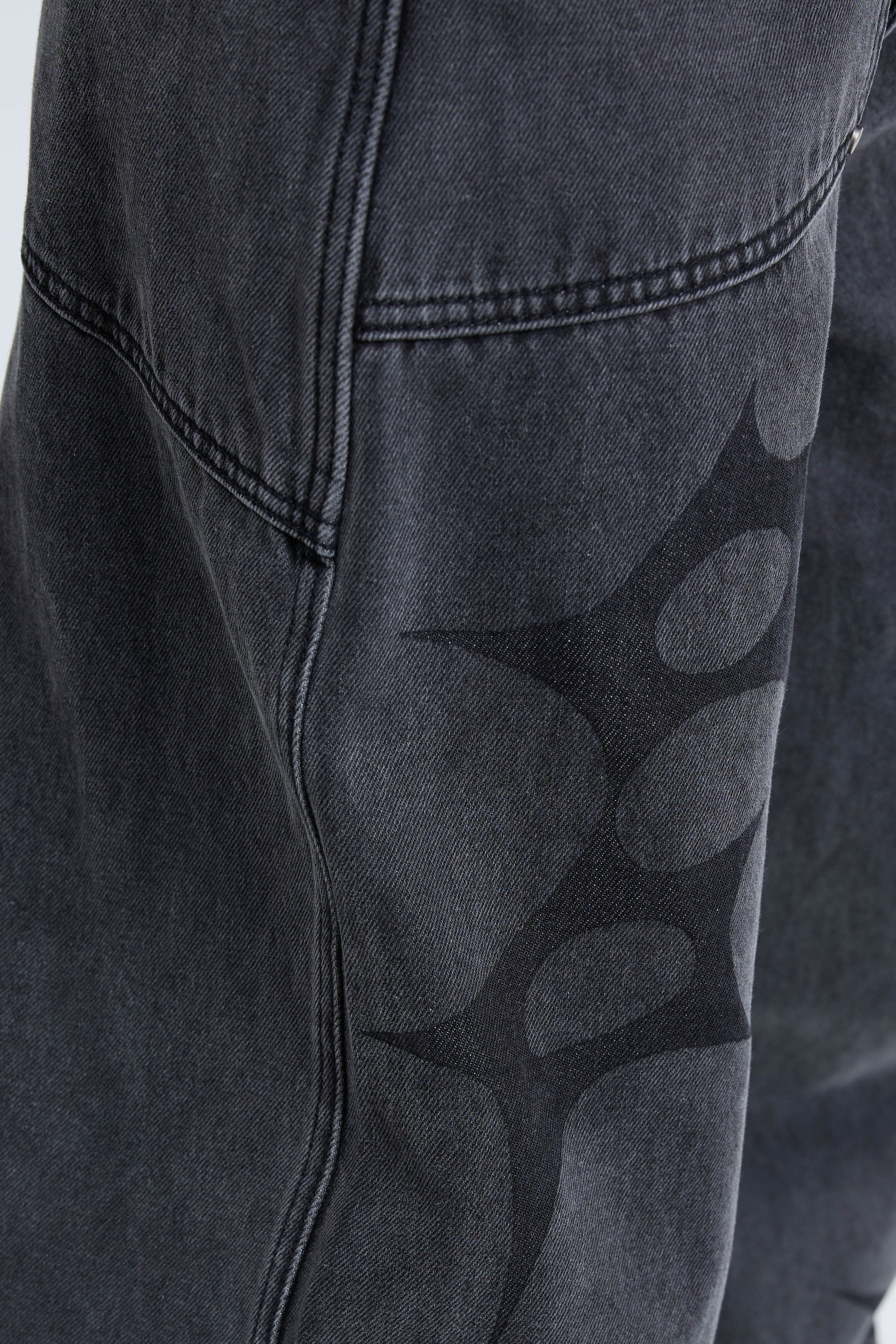 Slouchy Spike Jeans in Worn Black