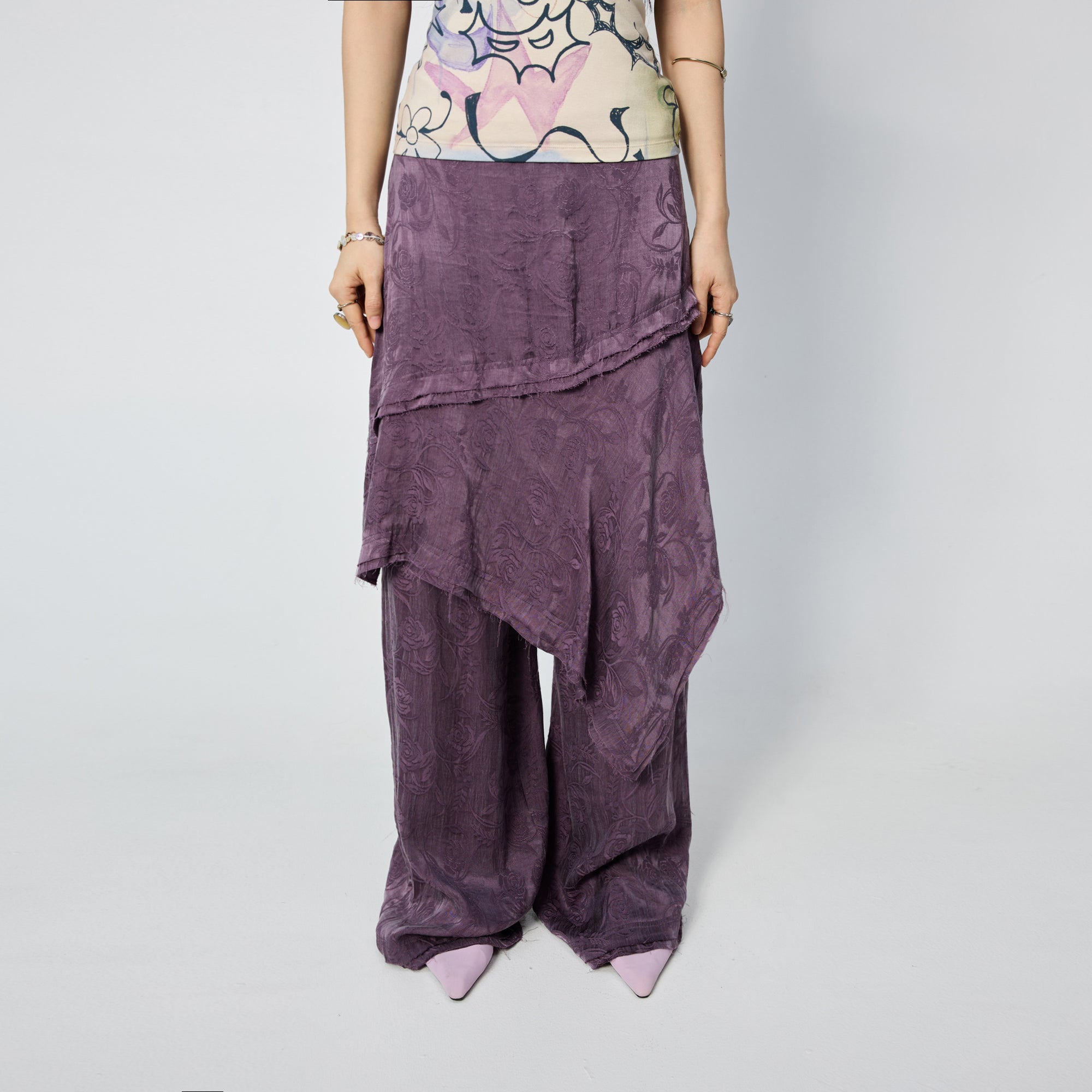 Arthur Apparel purple asymmetric skirt with frayed hem and roses print