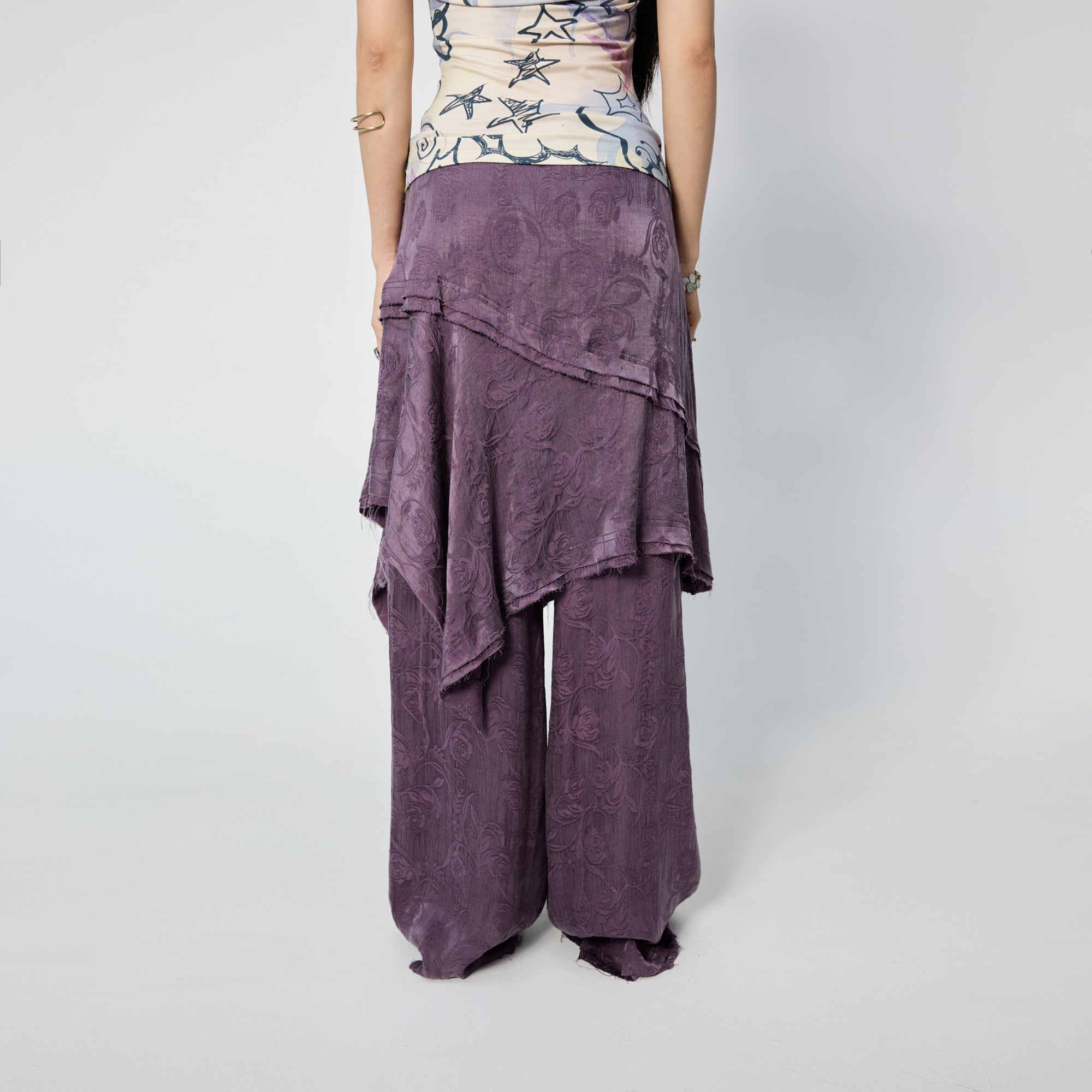 Arthur Apparel purple asymmetric skirt with frayed hem and roses print