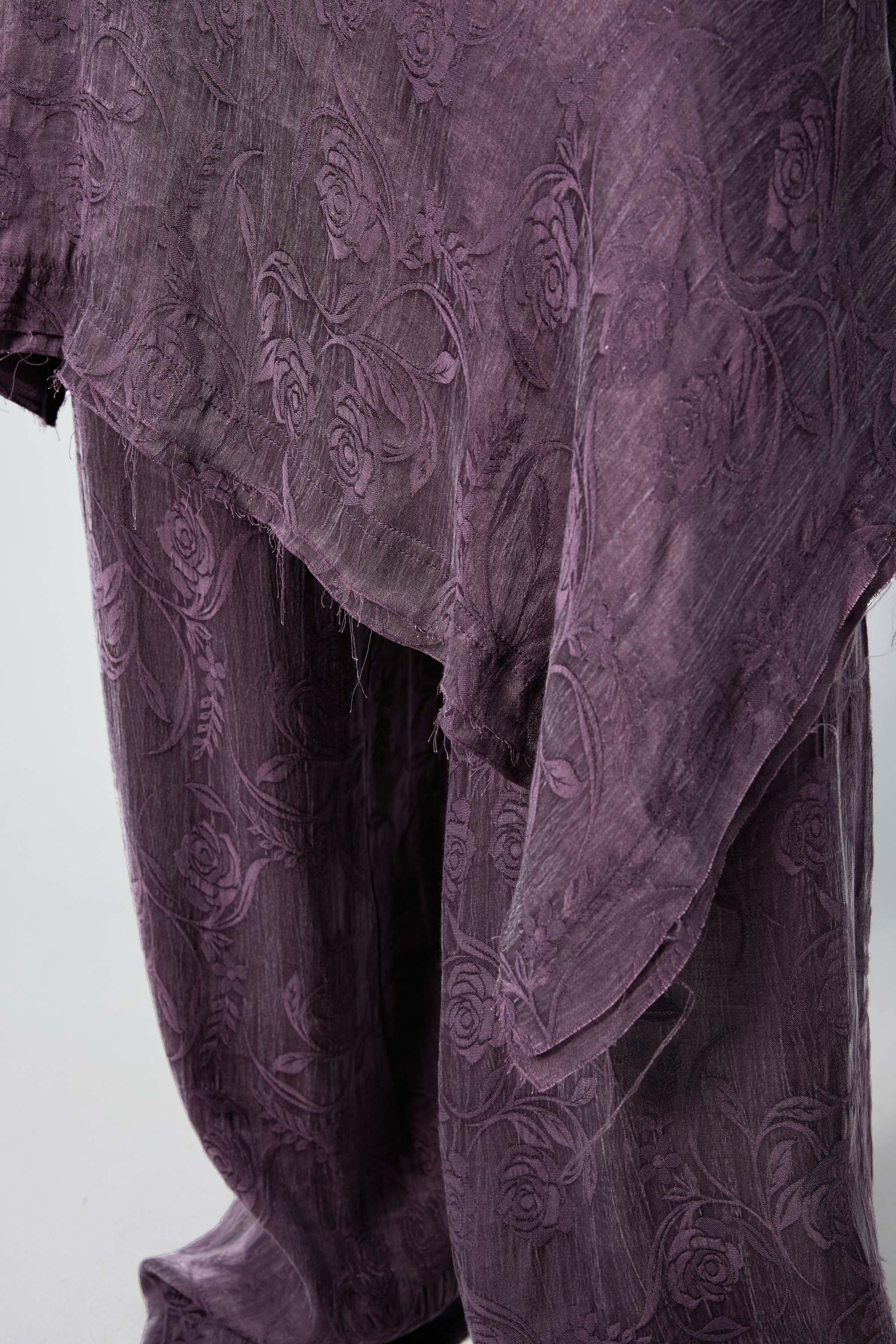 Arthur Apparel purple asymmetric skirt with frayed hem and roses print