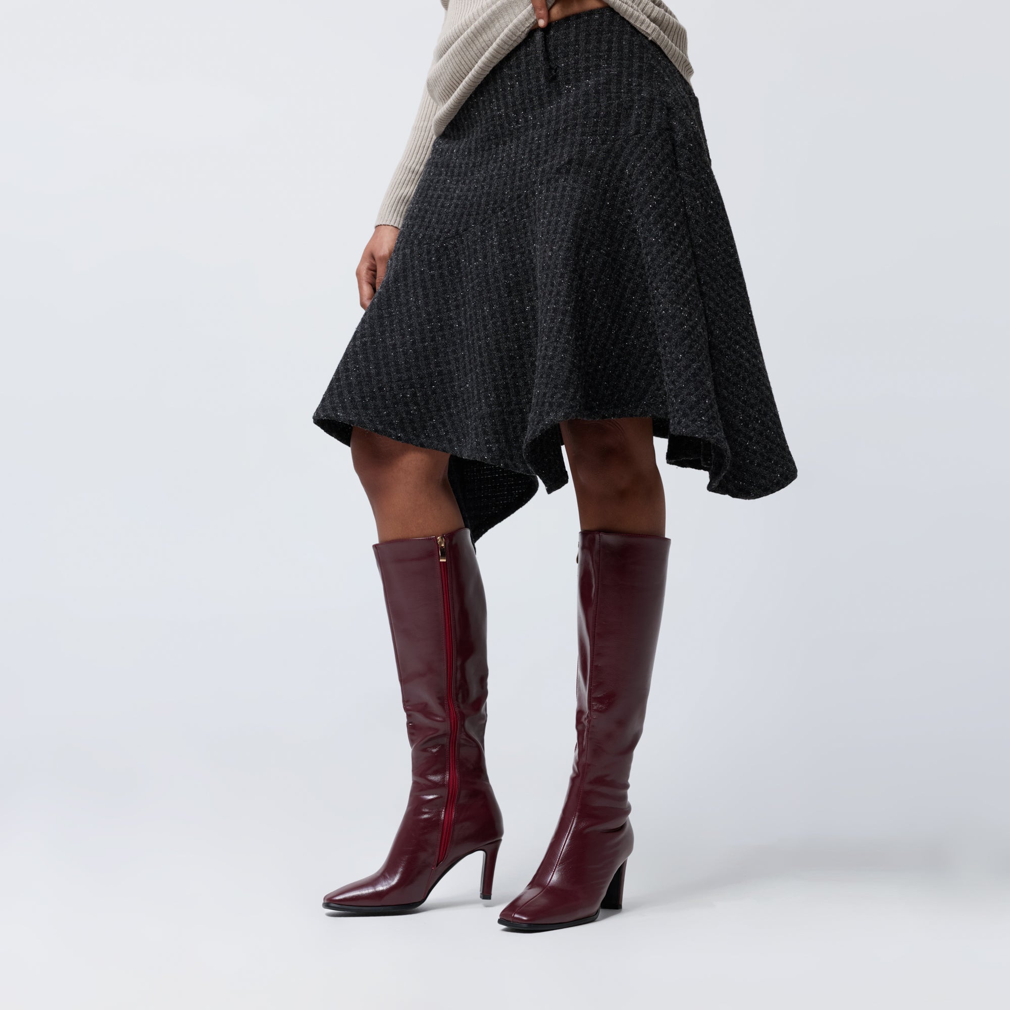 Arthur Apparel black wool blend knee length pixie skirt